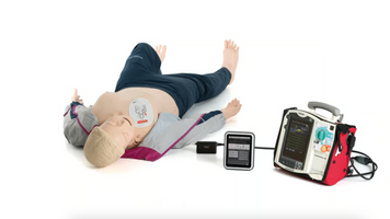 Тренажер для взаємодії з ручним дефібрилятором Laerdal Resusci Anne Simulator Paddle, IV Arm Right + SimPad Plus ман.42 фото